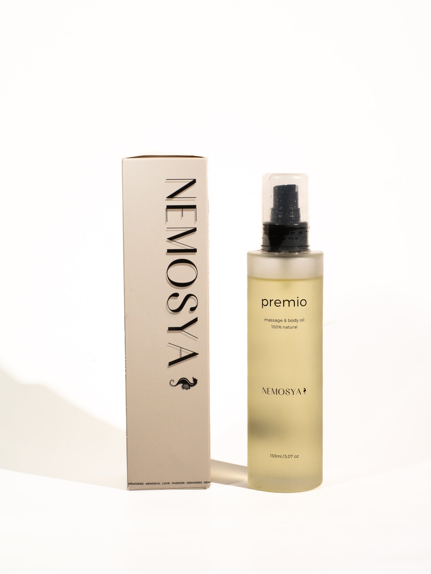 Nemosya premio, massage & body oil, 100% natural, coconut flavor, box and bottle, front angle.