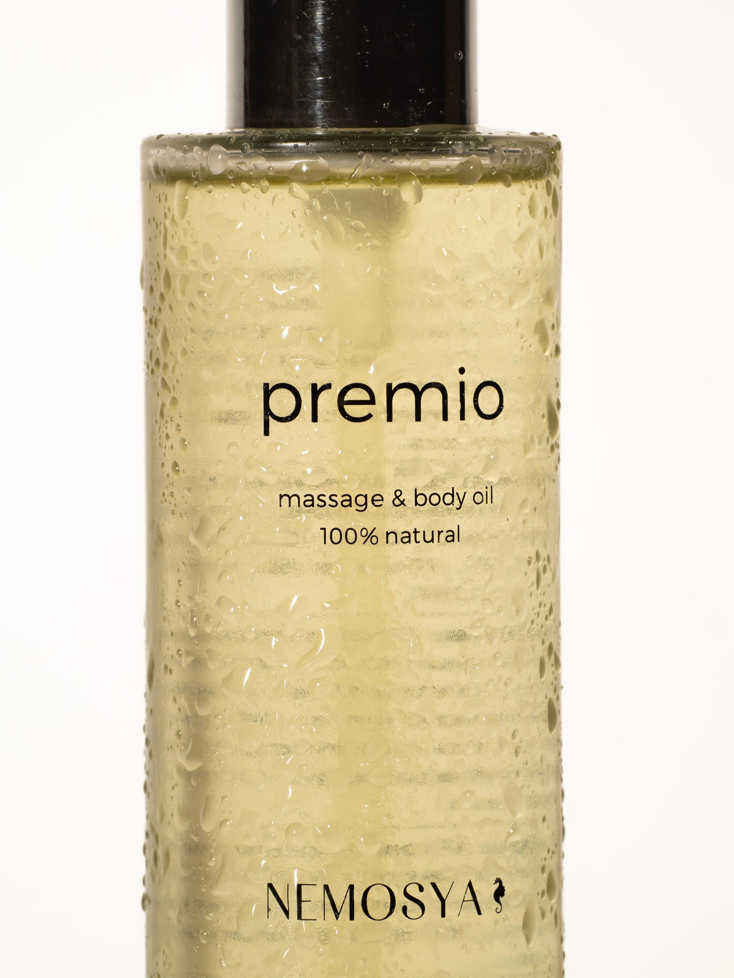Nemosya premio, massage & body oil, 100% natural, coconut flavor, bottle, zoomed angle