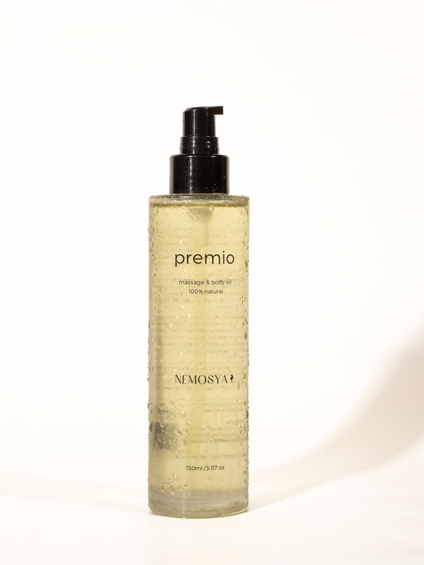 Nemosya premio, massage & body oil, 100% natural, coconut flavor, front side of bottle.