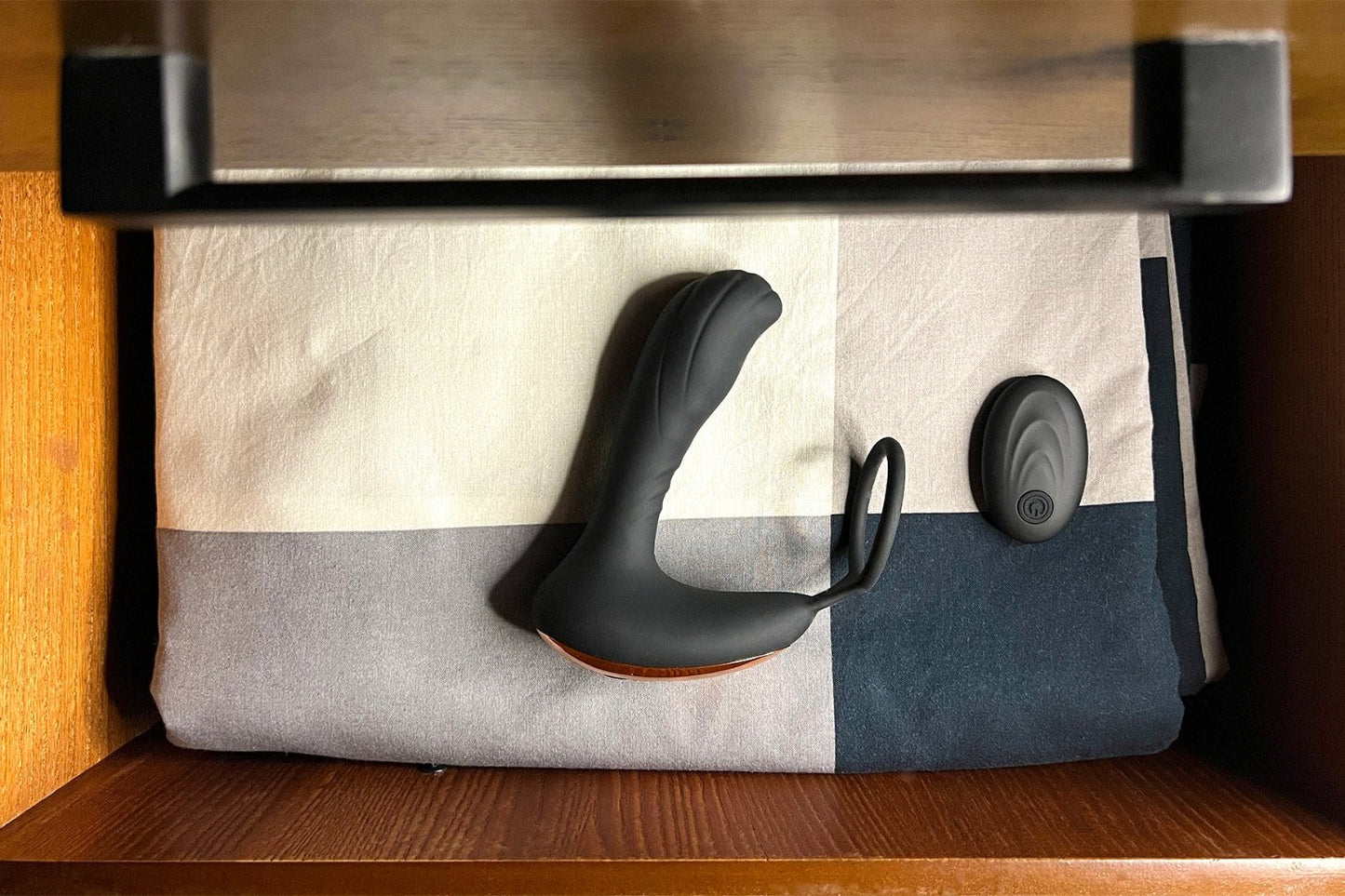 Remote controlled Prostate massager & cock ring, black, inside bedside drawer, remote, Come Now sex shop