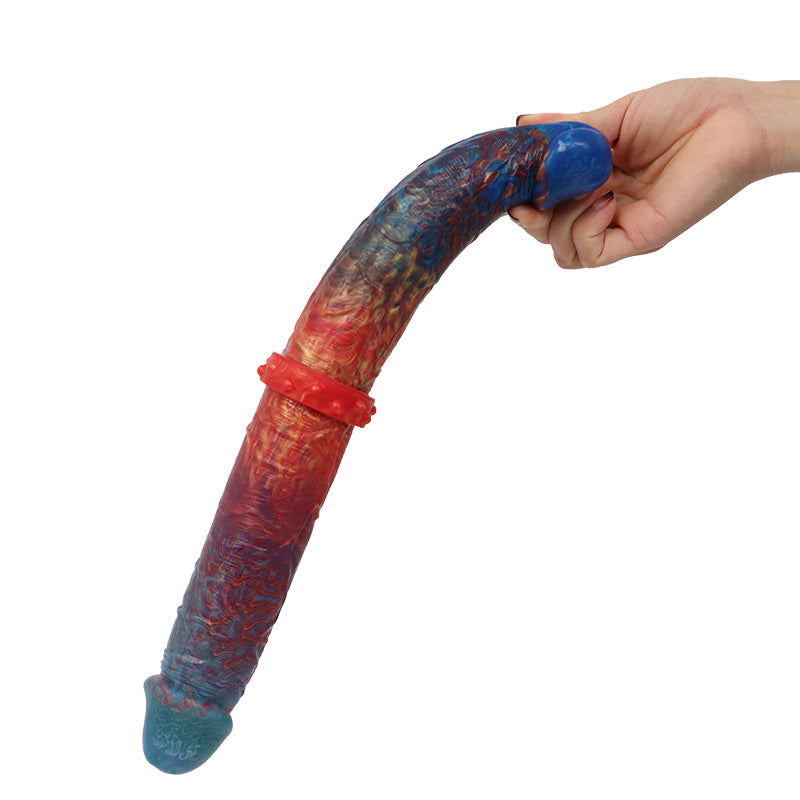 Double-sided dildo multicoloured front view with a hand pinching the tip - come now
