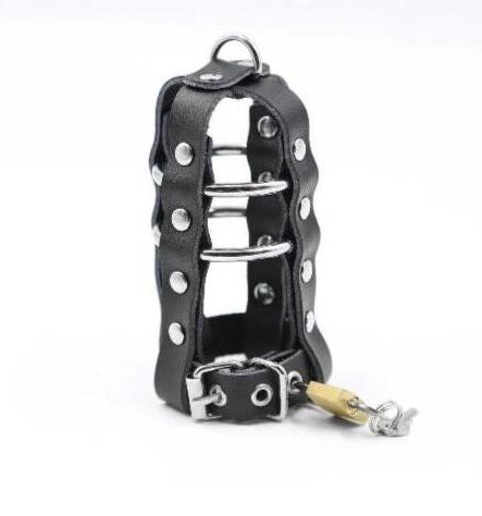 leather-penis-chastity-cage-standing-upright-locked-with-the-key-in-place
