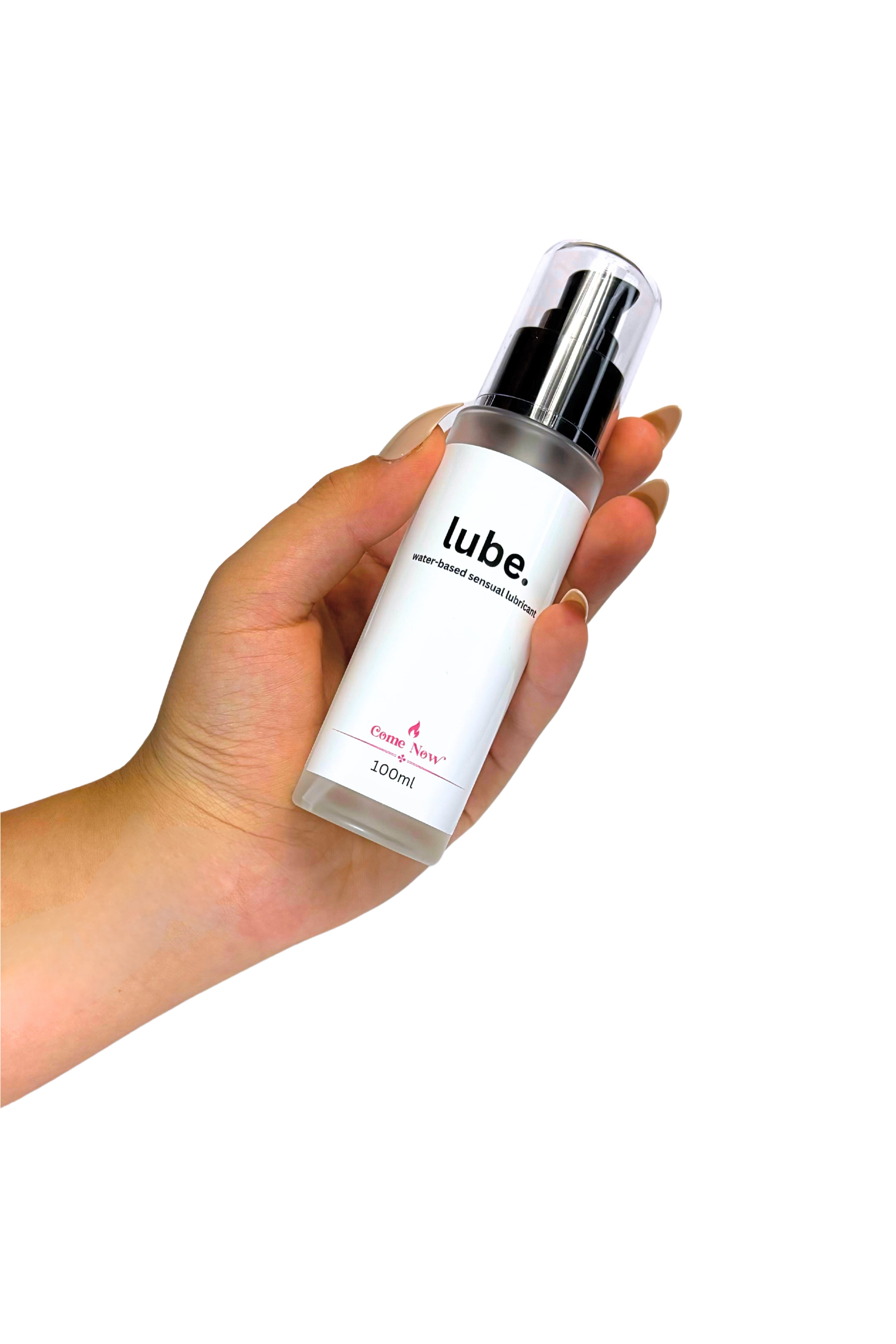 Water based lube, white bottle, black writing, front, held in female hand. Comenow.au