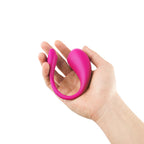 App controlled love egg, pink, laying in a female hand