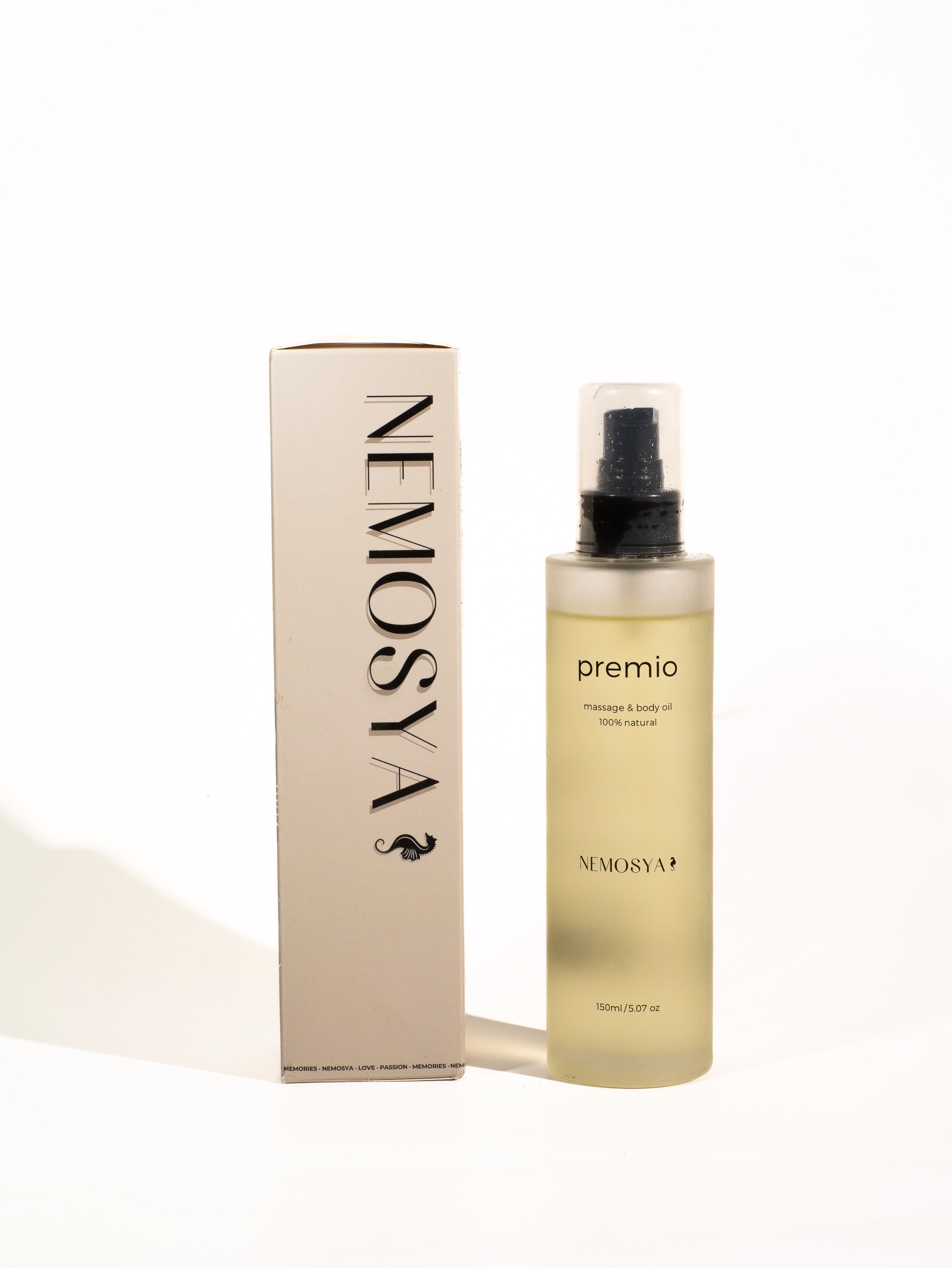 Nemosya premio, massage & body oil, 100% natural, coconut flavor, box and bottle, front angle.