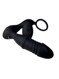 Close-up of vibrating end of prostate massager and cock ring with remote leaning on the product
