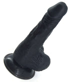 FAAK Essential Dildo in black, standing left side view
